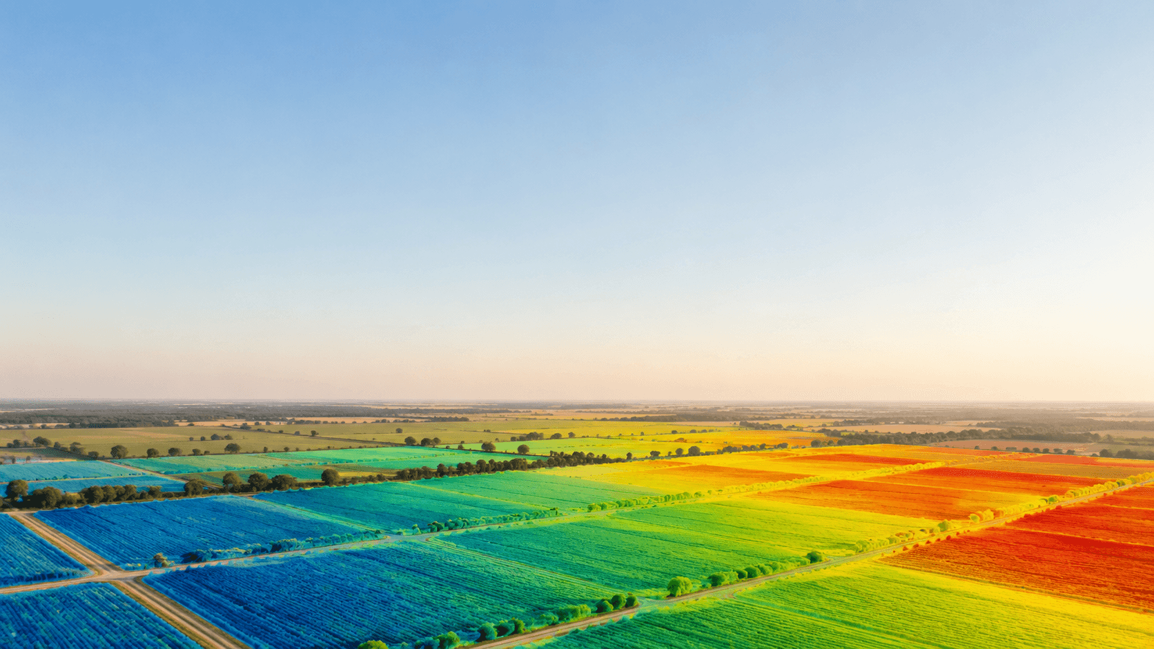 Vista aérea de parcelas agrícolas representadas con una escala de estrés hídrico